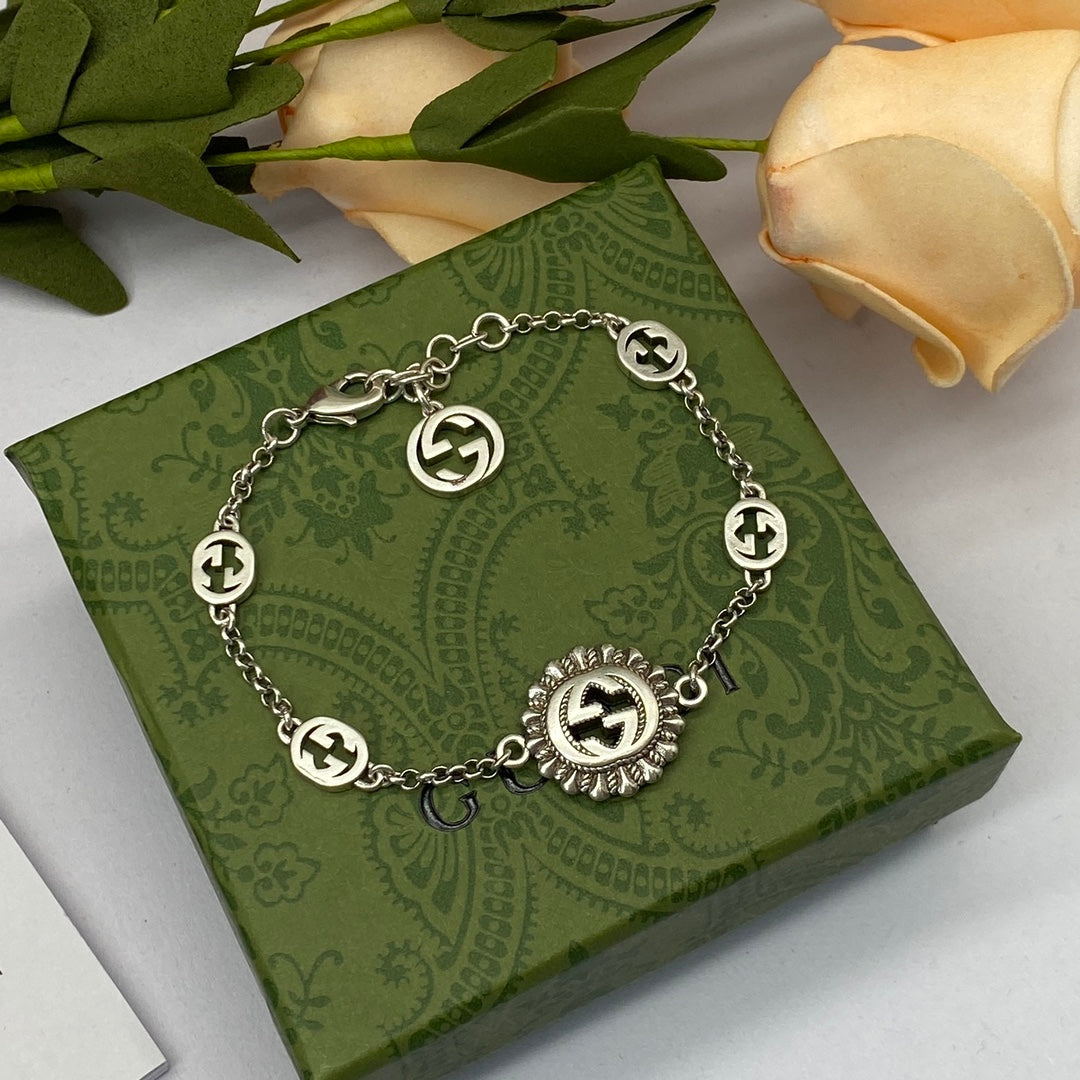 Vintage Silver Sunburst Logo Station Jewelry Set