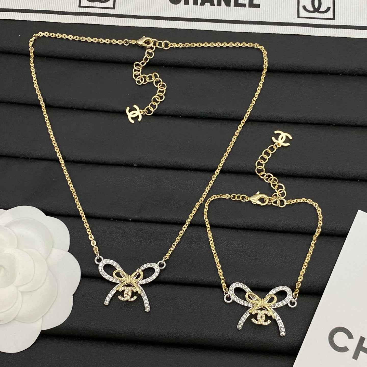 Crystal Pavé Bow Knot Jewelry Set | Logo Charm Clasp | Gold-Tone Necklace & Bracelet