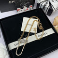 Crystal Bow Tennis Chain Necklace & Multi-Charm Drop Earring Set