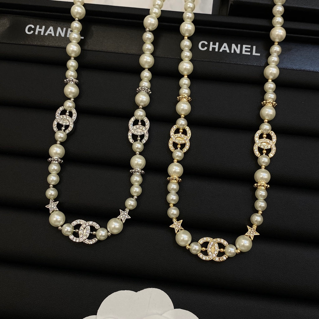 Long Faux Pearl Strand Necklace with Crystal Interlocking Loop & Star Charms