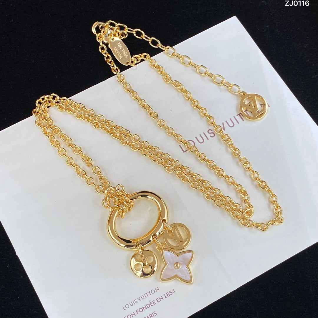 Gold-Tone Circle Ring Multi-Charm Jewelry Set – Shell Flower, Logo & Letter Pendant Necklace, Bracelet & Hoop Earrings