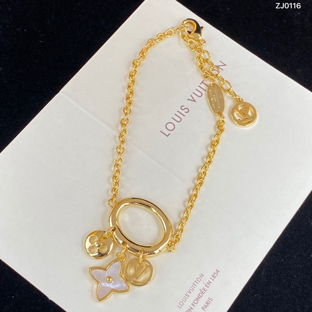 Gold-Tone Circle Ring Multi-Charm Jewelry Set – Shell Flower, Logo & Letter Pendant Necklace, Bracelet & Hoop Earrings