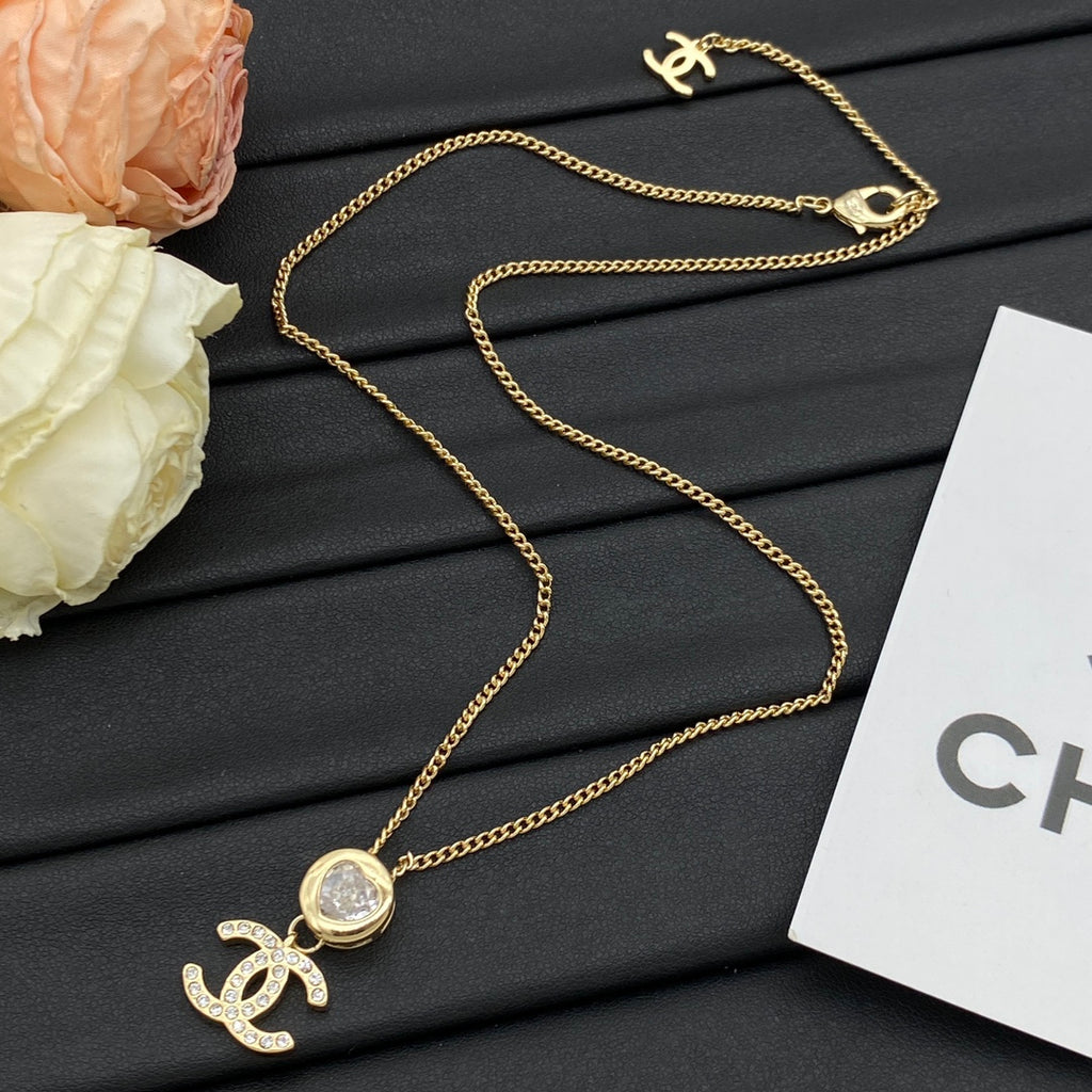 Crystal Bezel & Pavé CC Charm Curb Chain Necklace – Gold & Silver