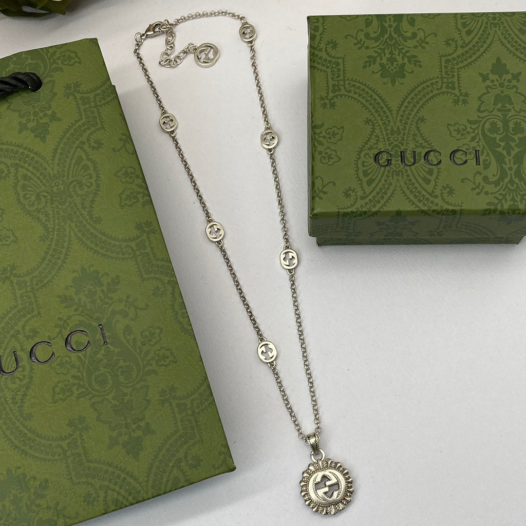 Vintage Silver Sunburst Logo Station Jewelry Set