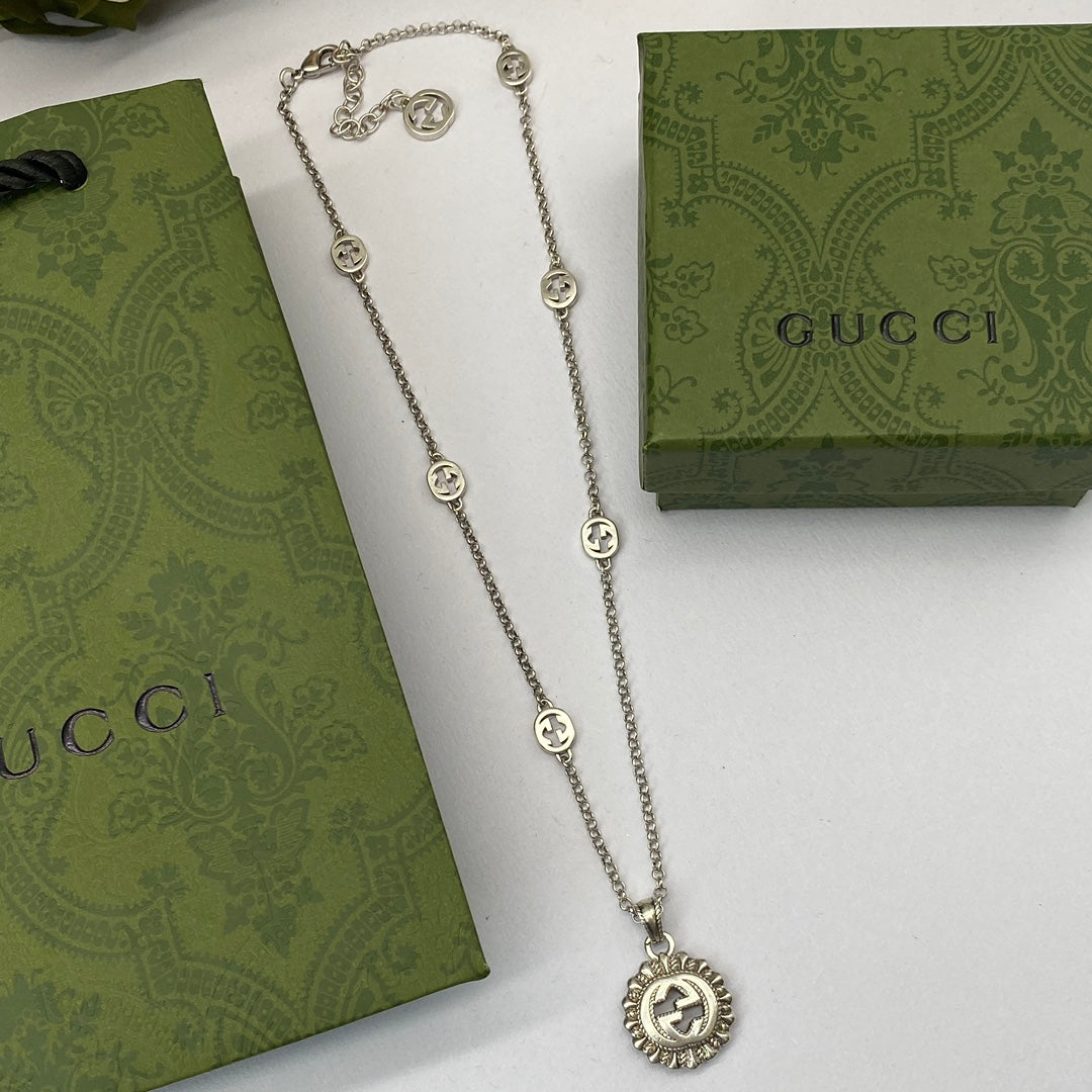 Vintage Silver Sunburst Logo Station Jewelry Set