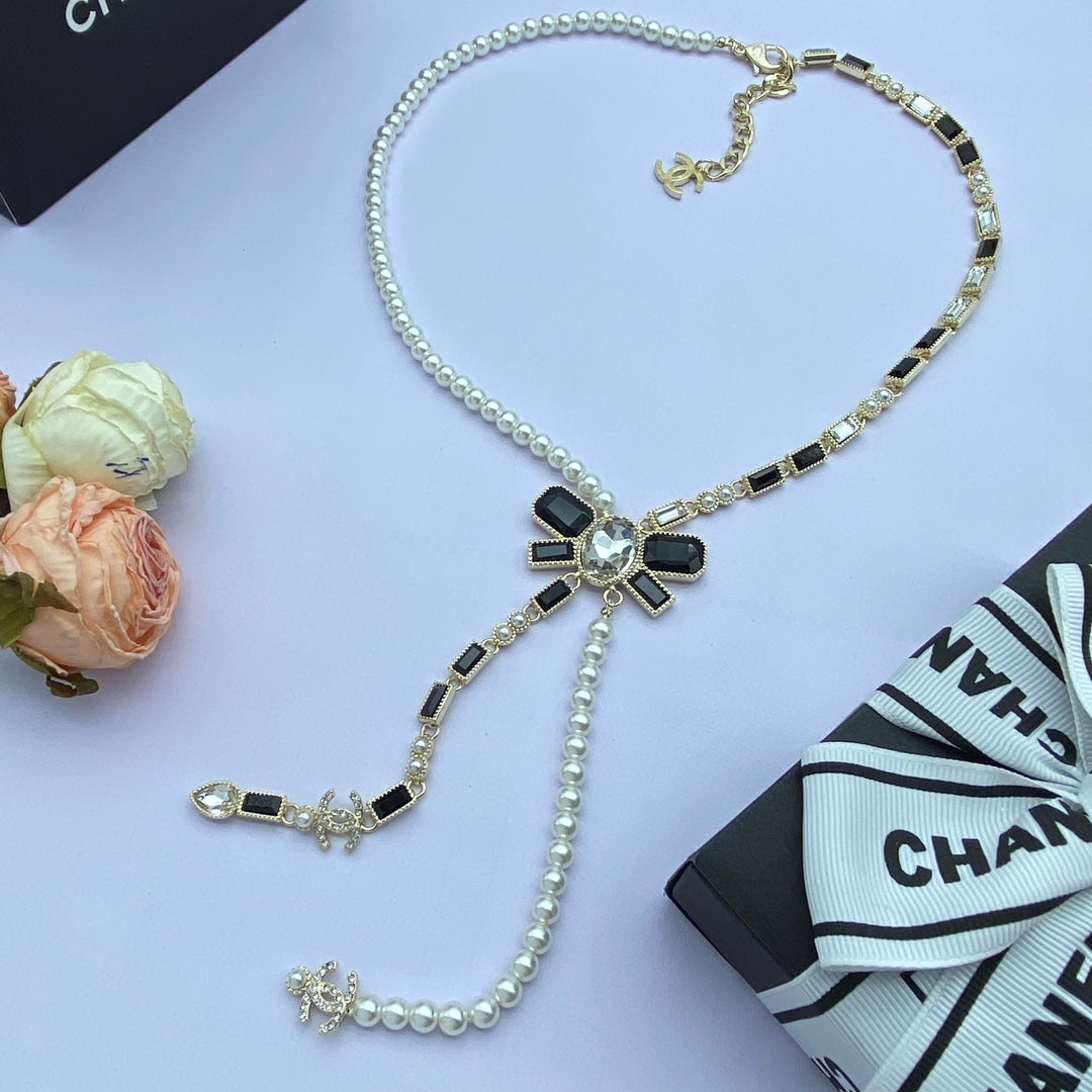 Pearl & Black Crystal Bow CC Tassel Y-Necklace – Gold & Silver