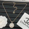 Crystal Medallion Pendant Necklace – Gold / Silver