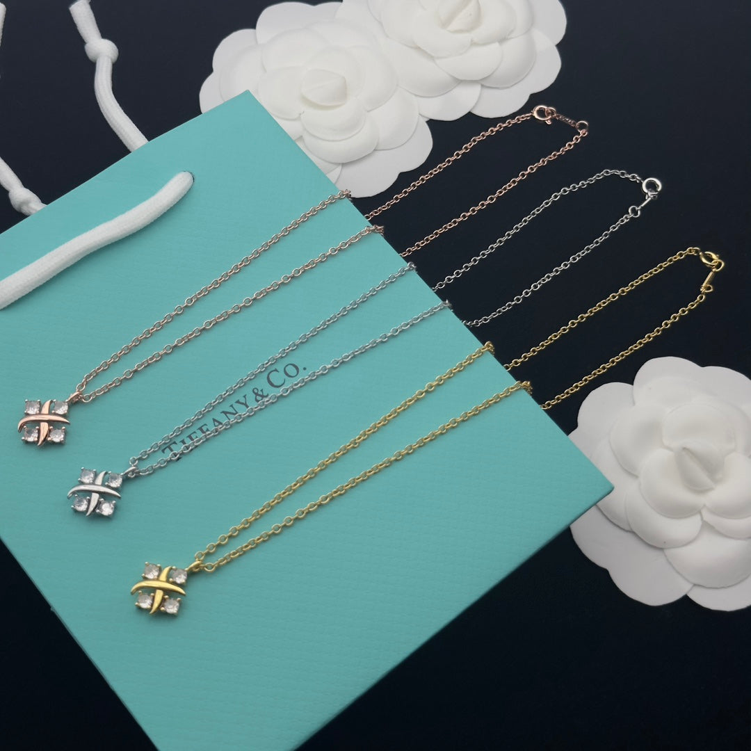 Crystal X Rivet Four-Leaf Clover Pendant Delicate Chain Necklace – Gold & Silver