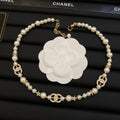 Long Faux Pearl Strand Necklace with Crystal Interlocking Loop & Star Charms