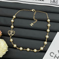 Faux Pearl Beaded Long Necklace with Crystal Heart Charm – Gold & Silver