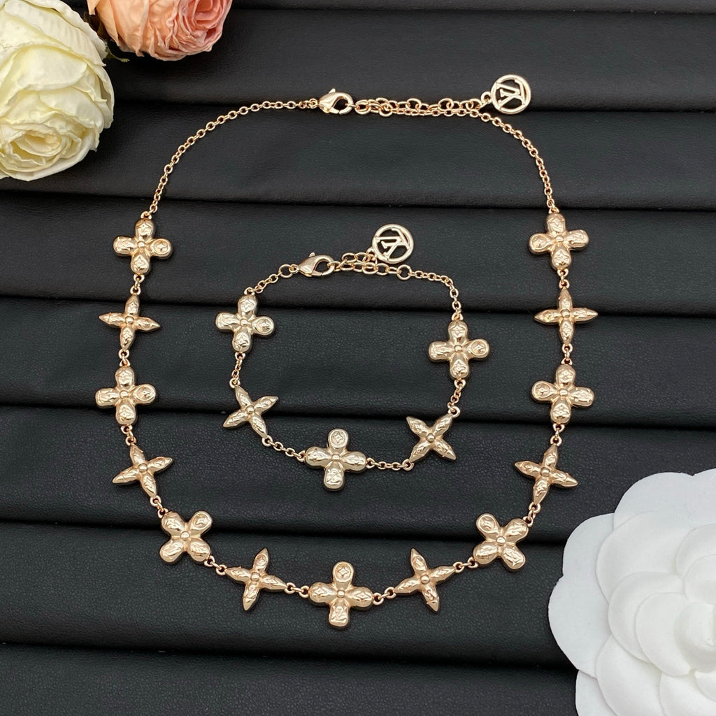 Embossed Four-Petal Flower Station Necklace & Bracelet Set