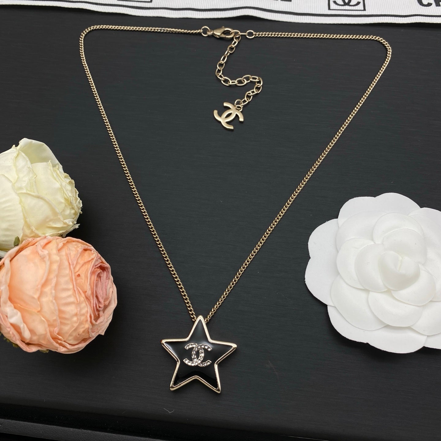 Black Enamel Star Pendant Necklace | Crystal Logo | Gold & Silver Tone