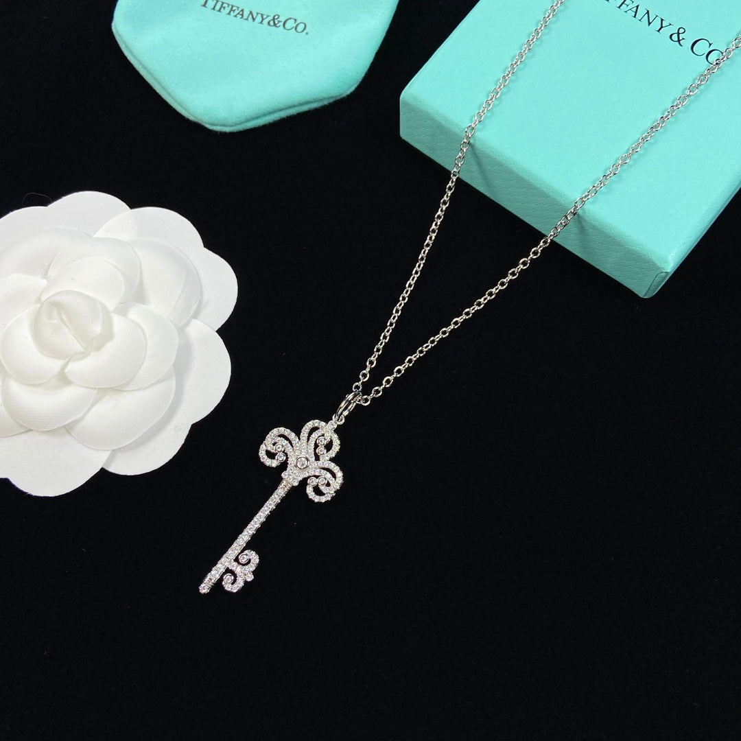 Pavé Crystal Baroque Scroll Floral Key Pendant Necklace – Gold, Silver & Rose Gold