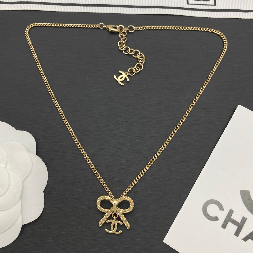Bow Knot Logo Charm Necklace | Curb Chain | Gold & Silver Tone