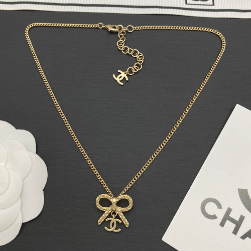 Bow Knot Logo Charm Necklace | Curb Chain | Gold & Silver Tone