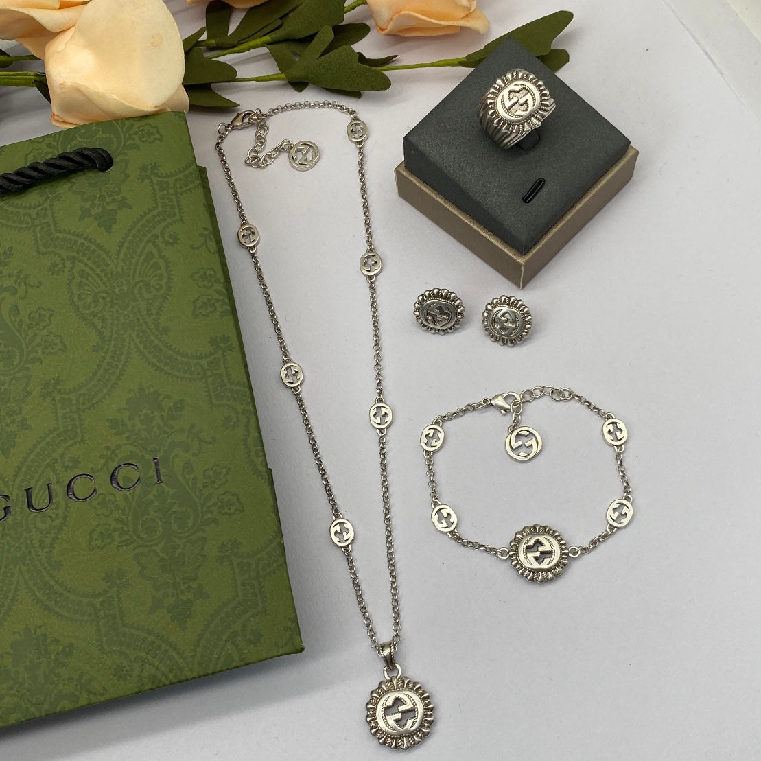 Vintage Silver Sunburst Logo Station Jewelry Set