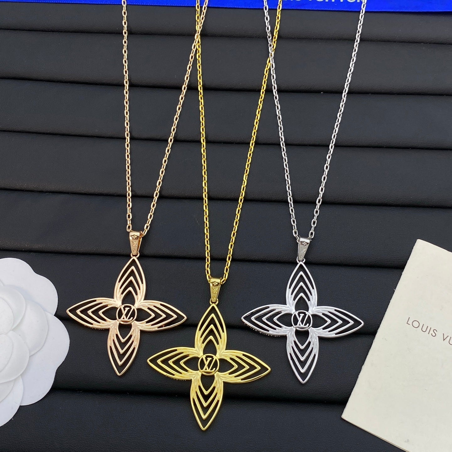 Oversized Hollow Four-Petal Flower Pendant Long Necklace