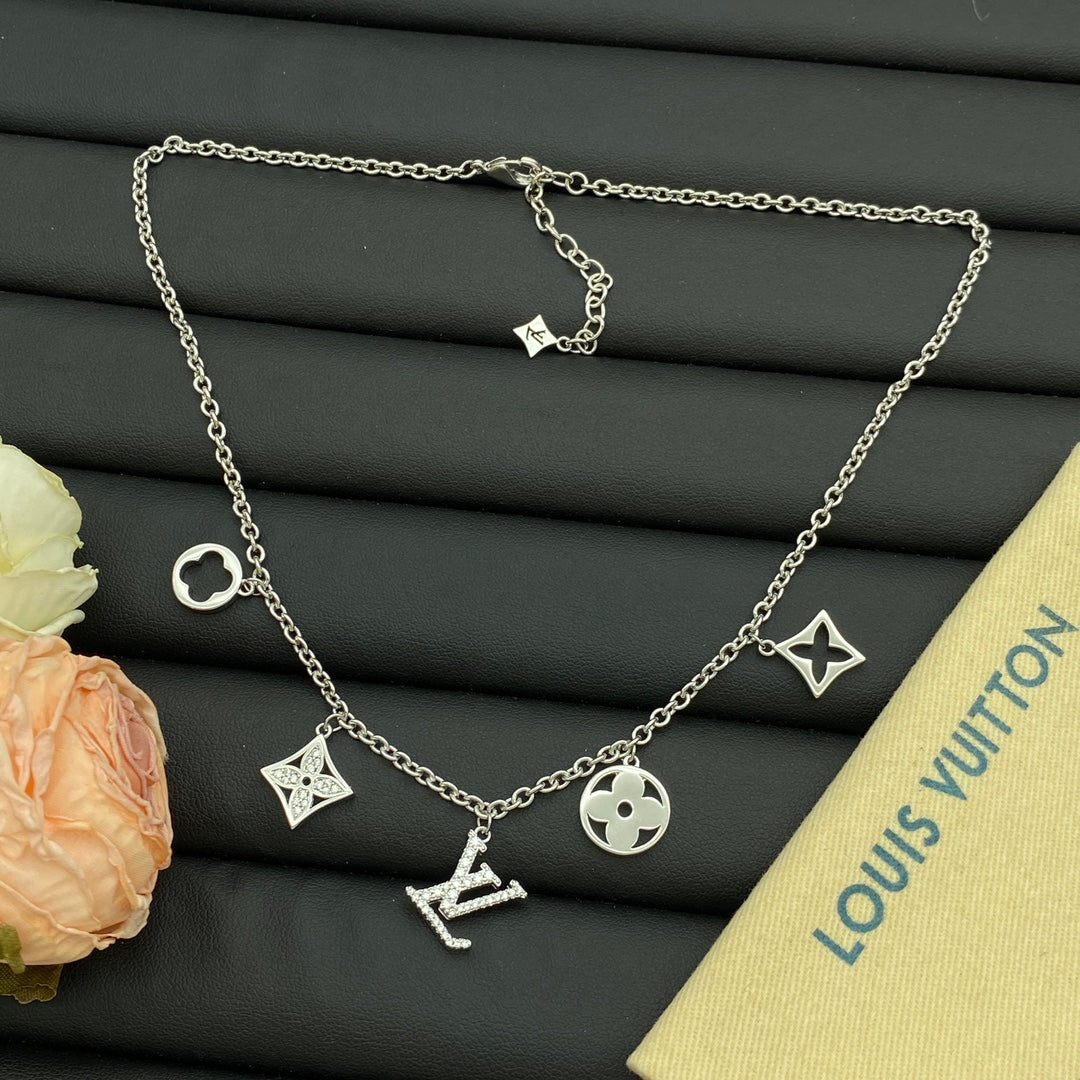 Mixed Shape Multi-Charm Dangle Station Necklace