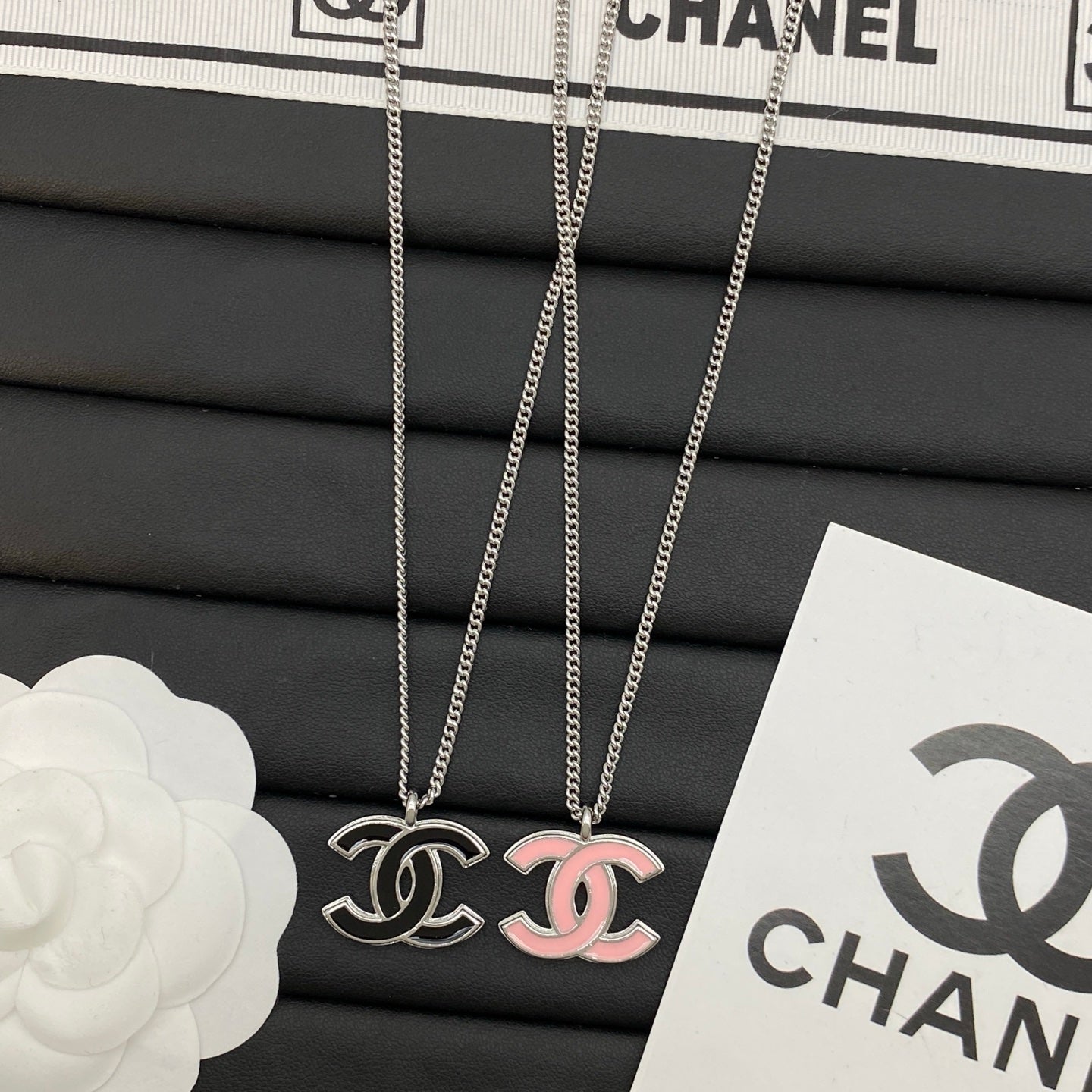 legant Intertwined Initial Pendant Necklace – Silver Chain, Black & Pink Enamel