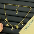 Mixed Shape Multi-Charm Dangle Station Necklace
