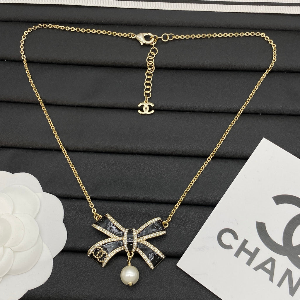 Crystal Bow Pearl Drop Necklace