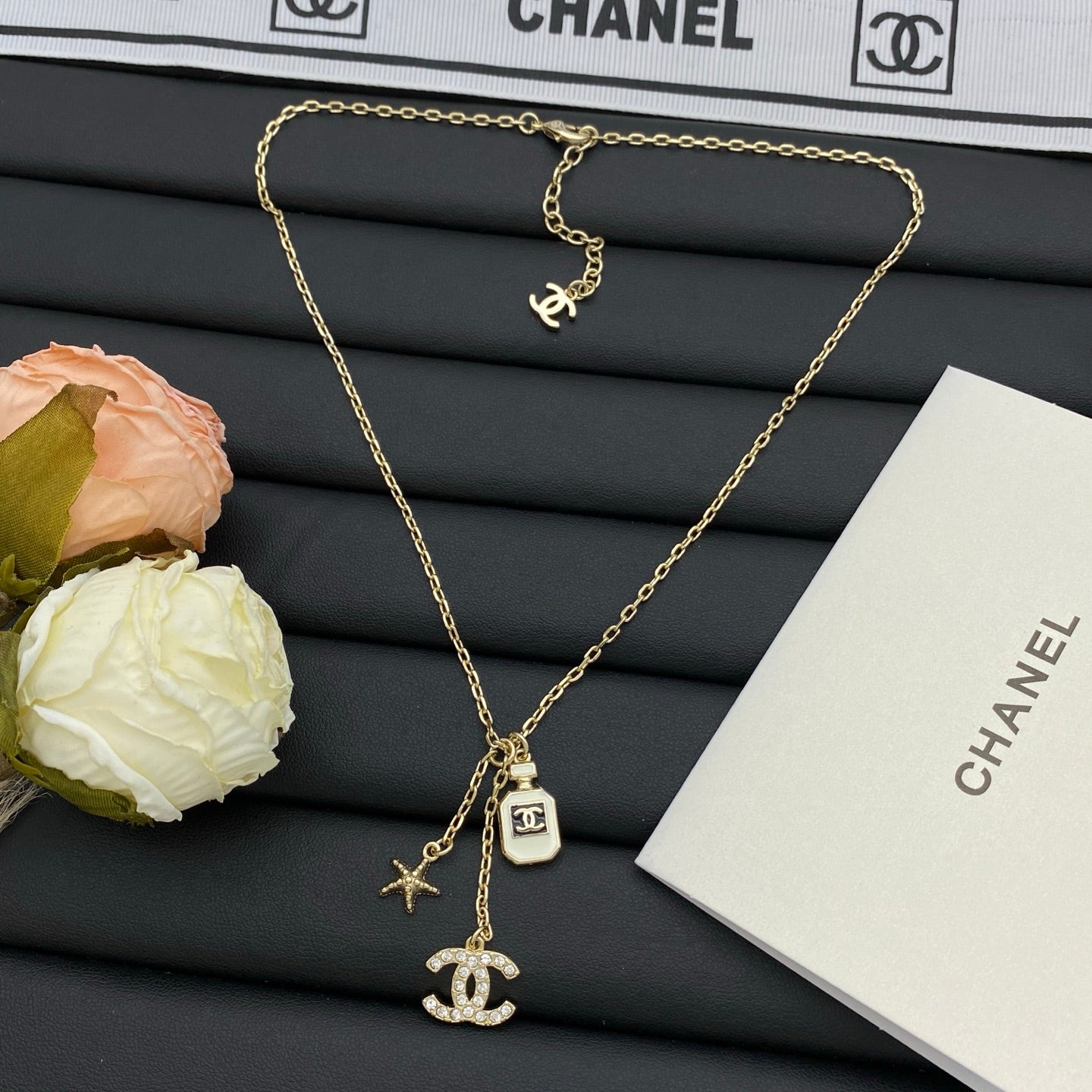 Crystal CC Perfume Bottle & Starfish Charm Necklace
