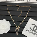 Pearl Beaded Long Necklace with Fawn & Crystal Interlocking Charm