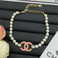 Faux Pearl Choker Necklace with Enamel Interlocking Circle Charm – Pink & Black