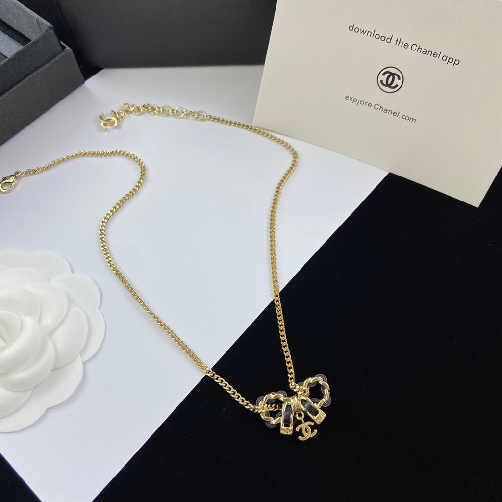 Black Leather-Woven Gold Chain Bow Pendant Necklace & Bracelet Set