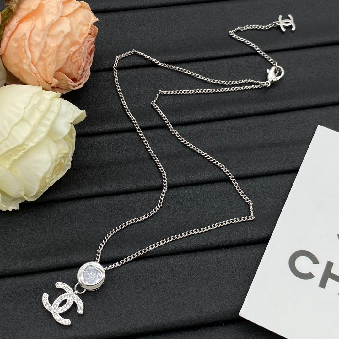 Crystal Bezel & Pavé CC Charm Curb Chain Necklace – Gold & Silver