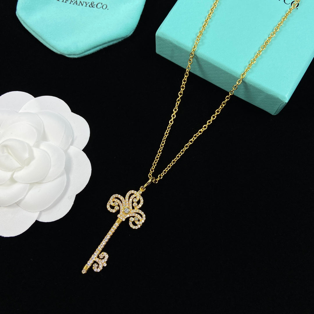 Pavé Crystal Baroque Scroll Floral Key Pendant Necklace – Gold, Silver & Rose Gold