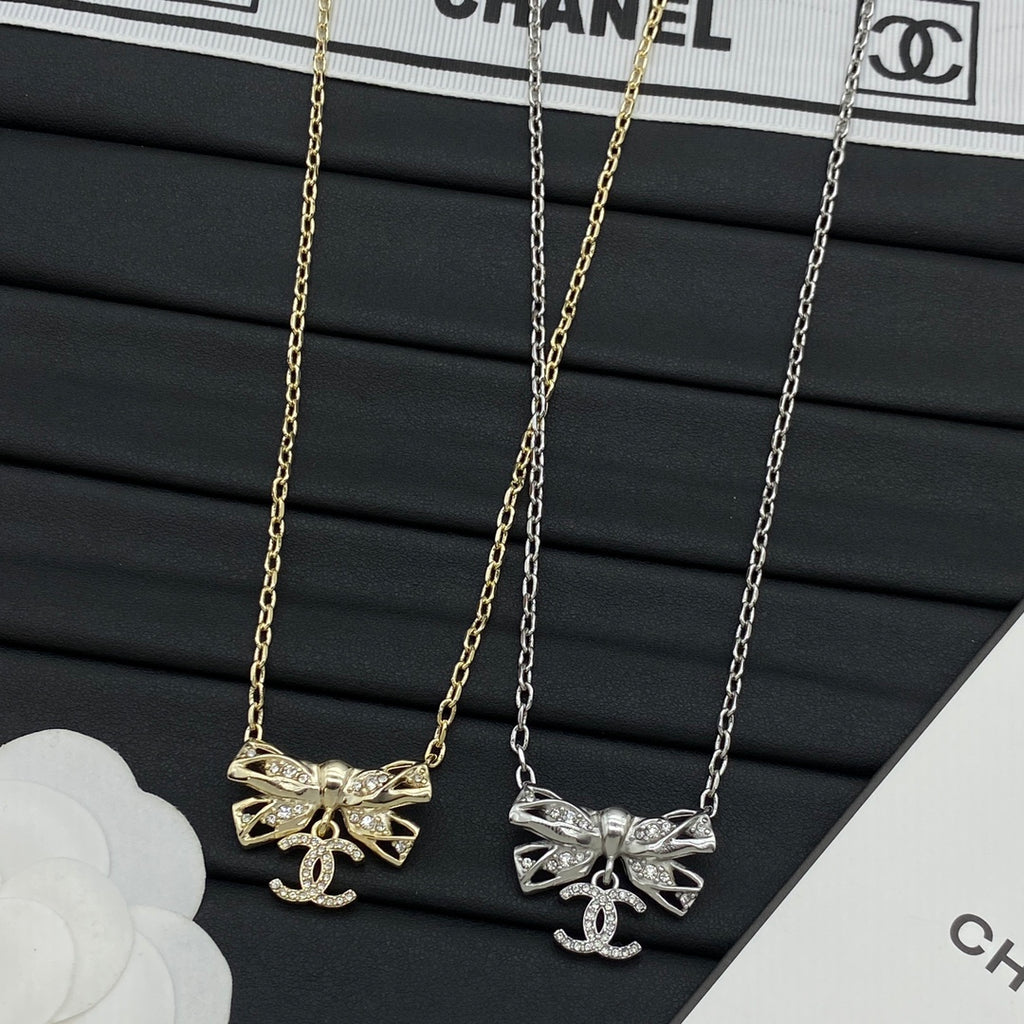 Pavé Crystal Hollow Bow & CC Charm Pendant Necklace – Gold & Silver