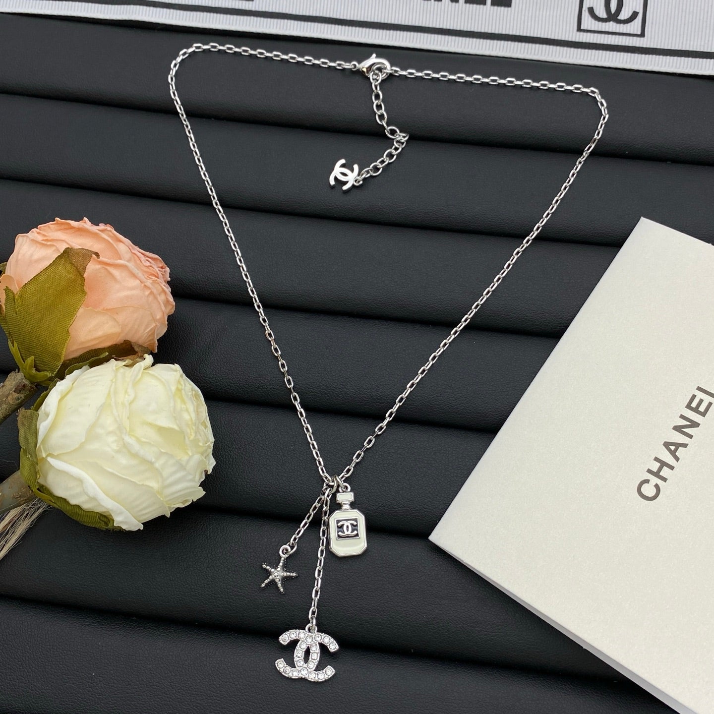 Crystal CC Perfume Bottle & Starfish Charm Necklace
